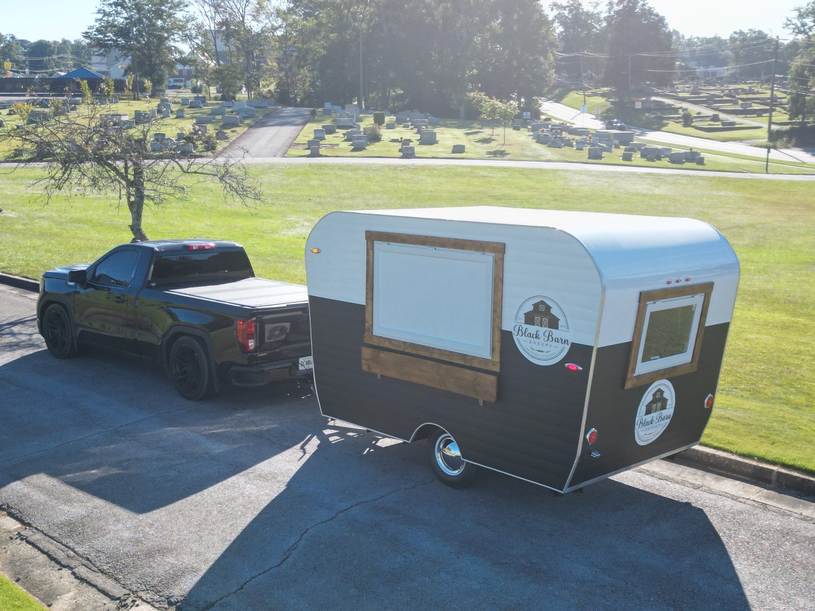 Black Barn Bakery concession trailer outdoors, service window toward the camera