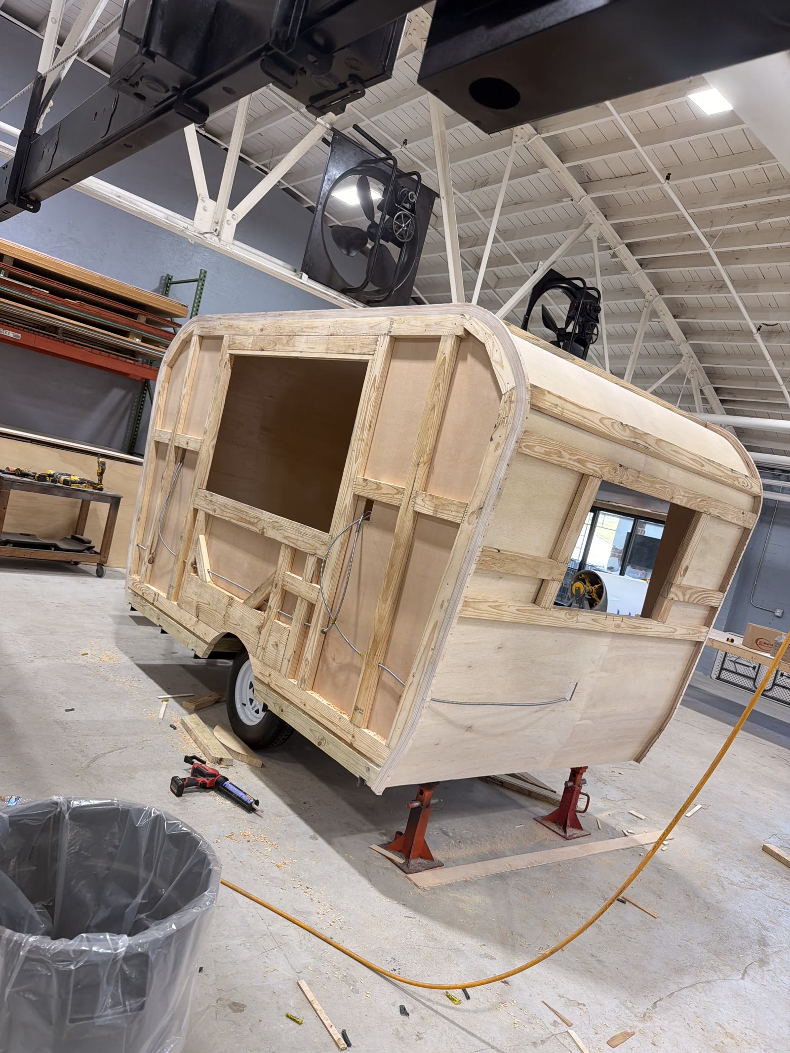 Wood wall framing inside a trailer under construction