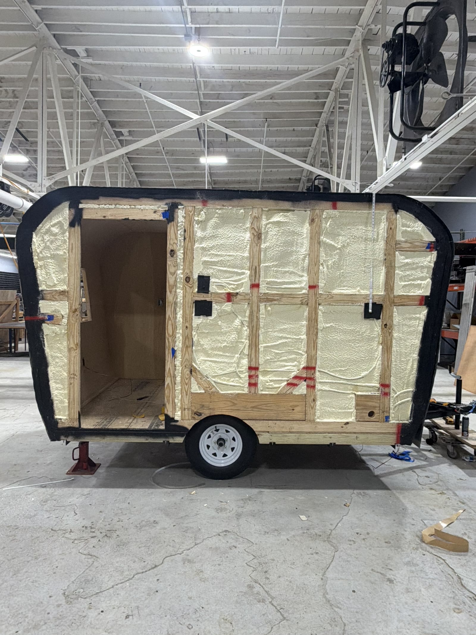 Closed-cell foam insulation inside a trailer