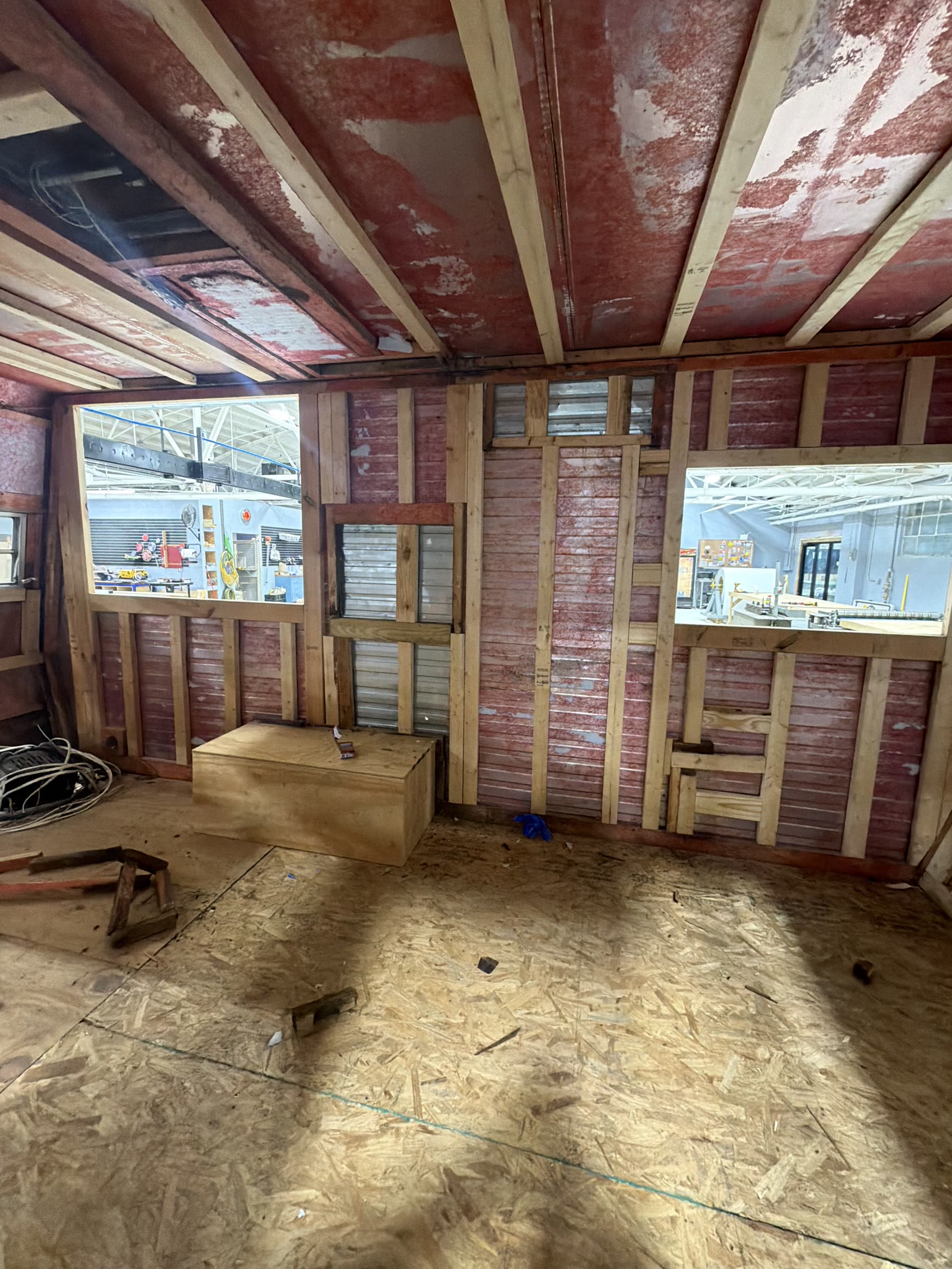 Interior framing and windows during a trailer renovation